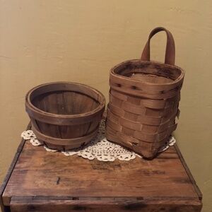 Bundle of two super cute small wooden wicker baskets.
